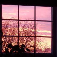 View of a sunrise through a window